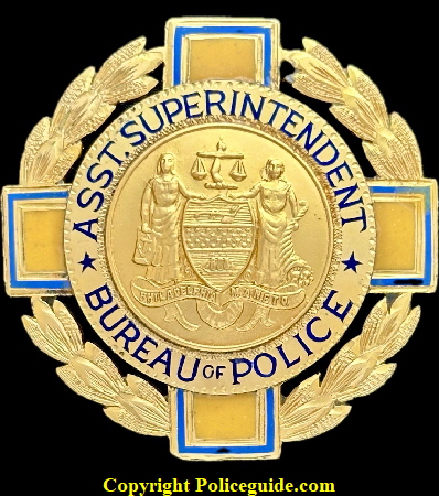 Caleb J. Brinton�s department issued Assistant Superintentent Bureau of Police Presentation shield. Made by Wm. Thegen�s Son Philada, PA