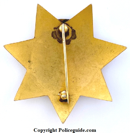 Back of Reno Police Dept. Captain Traffic badge made by Irvine & Jachens. Back of Reno Police Dept. Captain Traffic badge made by Irvine & Jachens.