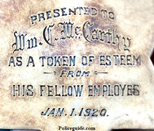 Back of gold badge reads: Presented to Wm. C. McCarthy As A Token Of Esteem From His Fellow Employes Jan. 1, 1920. Back of gold badge reads: Presented to Wm. C. McCarthy As A Token Of Esteem From His Fellow Employes Jan. 1, 1920.