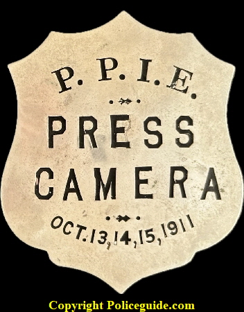 P. P. I. E. Press Camera Oct. 13, 14, 15, 1911 badge made by Irvine & Jachens 1027 Market St. S. F.