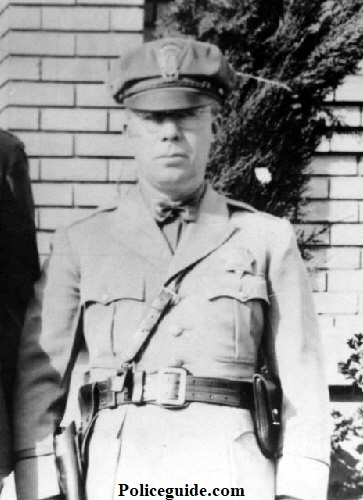 Roseville police officer George Cirby wearing his traffic officers uniform complete with leather case for his Pratt Combination hand cuffs.  According to Lance Young Bob started with the PD in 1930 and retired around 1952.