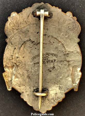 Back of badge showing the Irvine & Jachens hallmark.