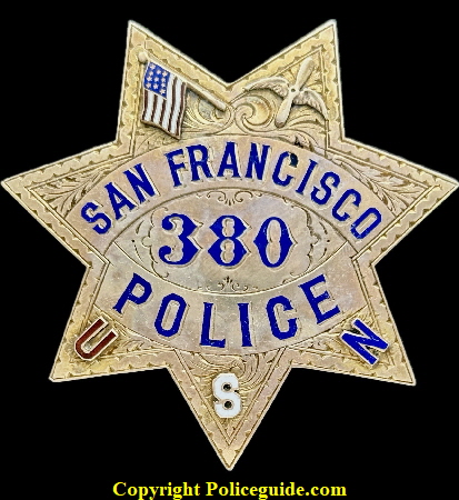 San Francisco Police Presentation Star #380 with applied U.S.A. flag to left, Wings and Propellar to right, and U S N in the bottom points. ( U. S. Navy.) San Francisco Police Presentation Star #380 with applied U.S.A. flag to left, Wings and Propellar to right, and U S N in the bottom points. ( U. S. Navy.)