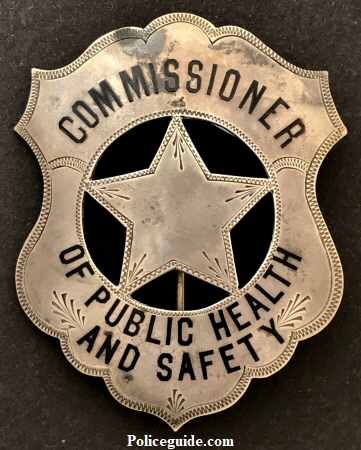 Charles A. Bliss was born Sep. 3, 1871 and died  Oct. 2, 1967 at age 96.  In  July 1912 he took office as the Sacramento Commissioner of Public Health and Safety which controlled the Police and Fire departments.  His badge is made of Coin Silver with hard fired black enamel.  On the back is stamped Coin Silver. 