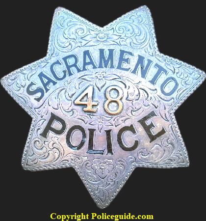 Sacramento Police star No. 48 presented on the reverse to Leslie C. Mills, Dec. 22, 1936 From Bea.  Badge is sterling silver and hand engraved.  Made by Ed Jones & Co. Oakland CAL.