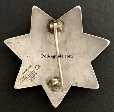 San Francisco Police Women Protective Officer badge #2, made by The Albert Samuels Co. Jewelers S. F.. Sterling.  Two women were issued badge #2, Mrs. Belle Love Dec. 19, 1908 and Katheryene C. Eisenhart Oct. 20, 1913.