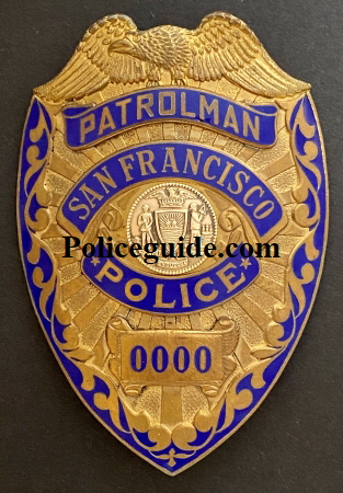 S.F.P.D. Prototype Badges.  Back in the 1970’s it was felt by the department that they should explore going to a more unique police badge.  Irvine & Jachens was tasked with coming up with new designs for consideration.  These three prototype’s were considered.  Badge number 88 was the badge number assigned to officer Russ Dickey.   Russ was issued the badge to wear on duty and seek opinions and feedback from fellow officers and the public.  Both badges 88 and 123 are sterling silver with hand engraved leafing highlighted by recessed black enamel.  Badge 0000 was a departure from the 7 point star worn for more than 100 years.  The badge featured reverse blue enameled panels and borders and a sterling silver city seal.  Tradition won out and it was decided no change would be made.  To this day badge 88 worn by Russ Dickey is the only department authorized prototype badge to be worn.