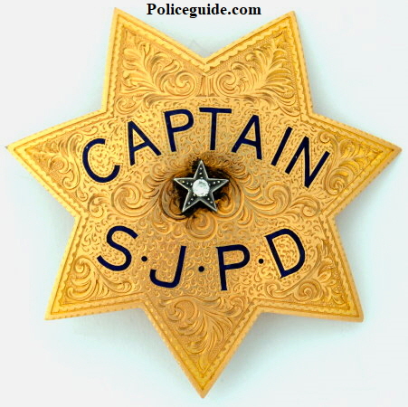 San Jose Police Captain Charles Hertell wearing his 14k gold badge.  Presentation on the reverse reads:  Presented By That Old Fishing Gang Of Mine Feb. 12-30.
