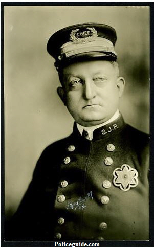 Photo taken August 11, 1925.  John Newton Black, San Jose Police Chief joined the San Jose Police Department in 1909 after serving seven years with the Santa Clara Co. Sheriff's office. In 1916 Black who was then a Captain was promoted to Chief of Police, a position he held until his retirement in 1944.  Pictured above is Chief Black wearing his custom jeweler made badge with the added banner showing his years served as Chief.