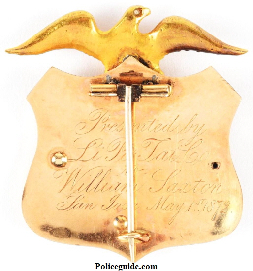 Reverse of City Marshal Badge showing presentation:  Presented by Li Po Tai Co. to William Saxton San Jose May 1872.