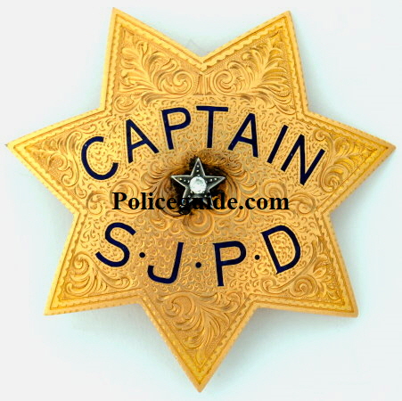 San Jose Police Captain Charles Hertell wearing his 14k gold badge.  Presentation on the reverse reads:  Presented By That Old Fishing Gang Of Mine Feb. 12-30.
