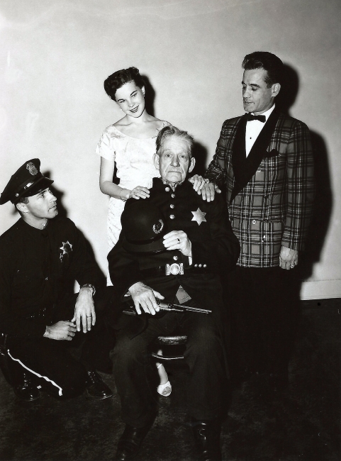 Left to Right - Officer Wittman, Actress Wanita Wilent, seated Sergeant Loyd Buffington  actor Murray Hamilton to his right.