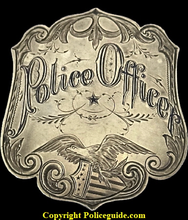   Police Officer San Luis Obispo, 1878 Presentation badge, jeweler made, sterling silver, hand engraved, hard fired enamel. 