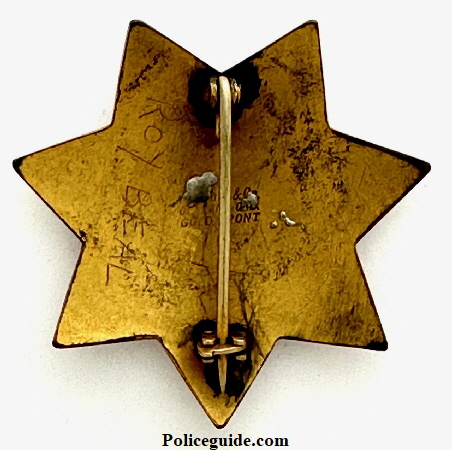 Back of Yreka Special Police Badge No. 2 hallmarked Ed Jones & Co. Gold Front and having the name Roy Beal inscribed.