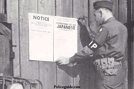 U.S. Army Military Police posting notices.
