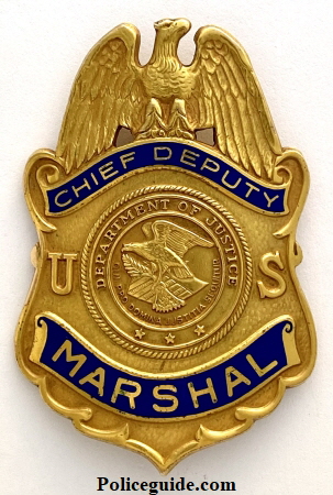 This is one of the original 1950 National issue Chief Deputy U.S. Marshal badges made by Robbins 1/20 10K GF.