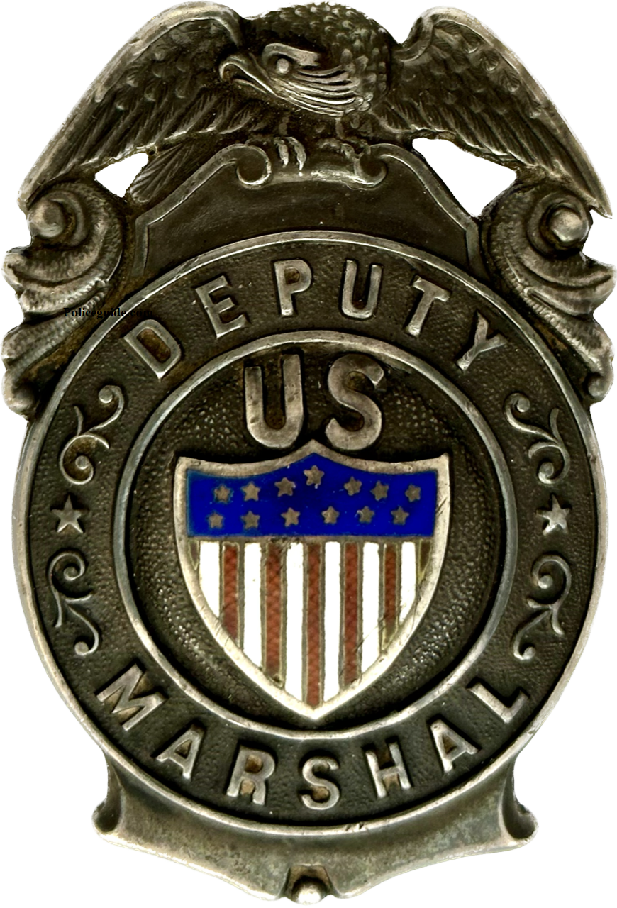 Deputy US Marshal shield, sterling silver with applied red, white and blue federal seal.