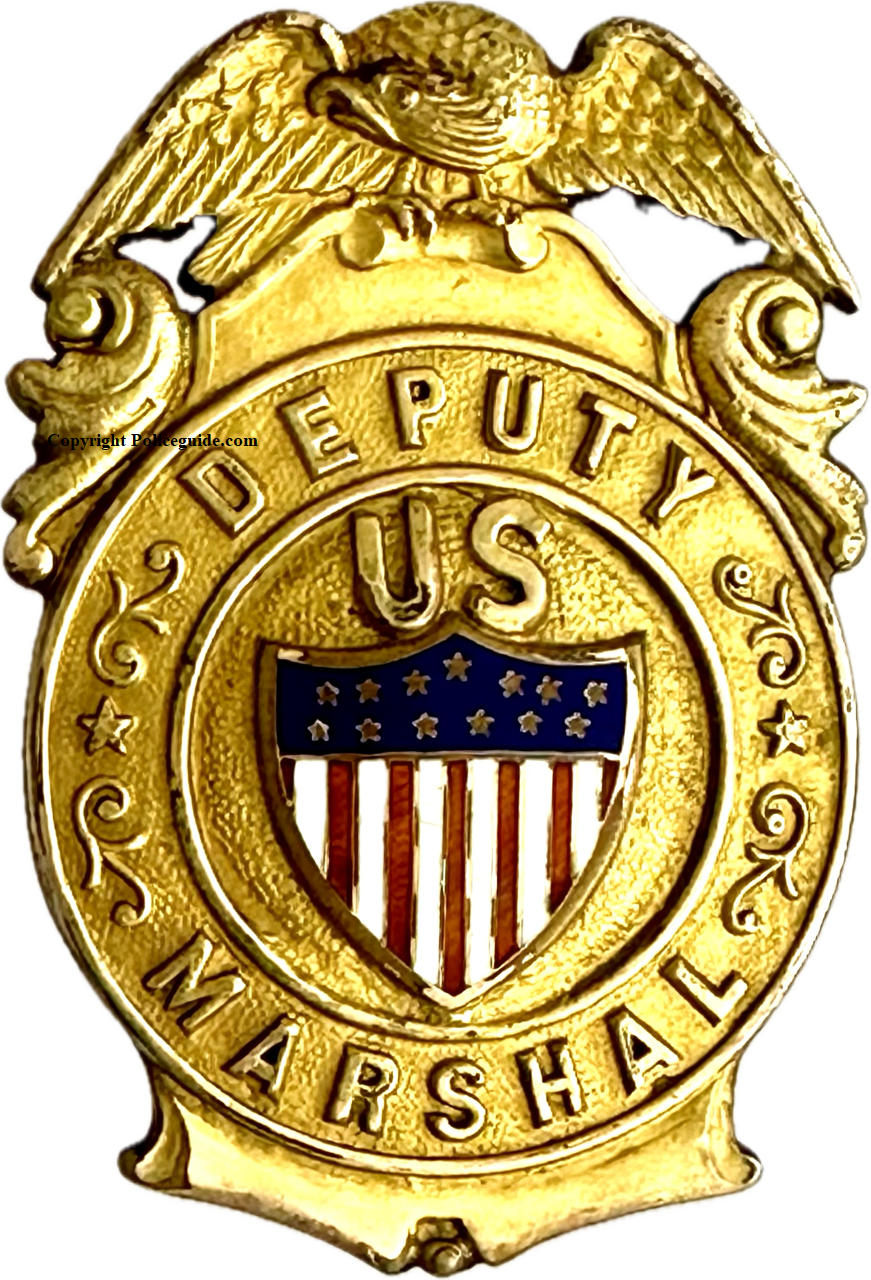 Deputy US Marshal shield, gold front with applied red, white and blue federal seal, worn by Donald E. Martin.