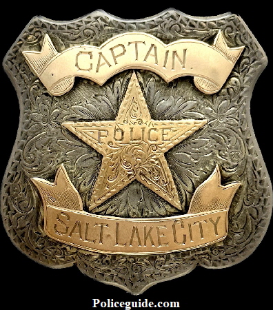 Salt Lake City Police Captain badge hallmarked E.J. Leiff MFG. Salt Lake STERLING.  Adorned with 14k gold panels.