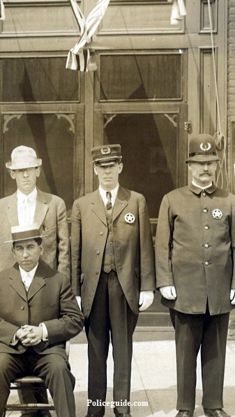 Standing center is Chief and on the right is Ira Cresap who later became Sheriff of Clarke County, WA