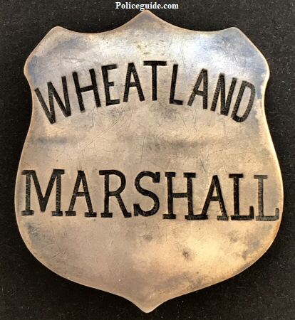 Wheatland Marshall badge made of sheet silver, T-pin and C-catch.  Circa 1900.